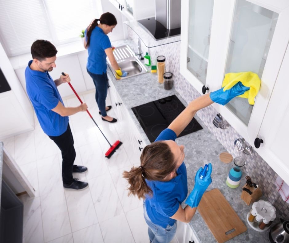Premium house cleaning team in Vancouver working together in a modern kitchen